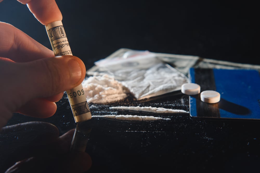 prescription-opioid-addiction-snorting-pills-heroin-misuse-gateway-drug
