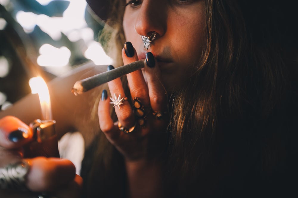 smoking-a-joint-marijuana-cannabis-drug-use-addiction-problems-drug-rehabilitation