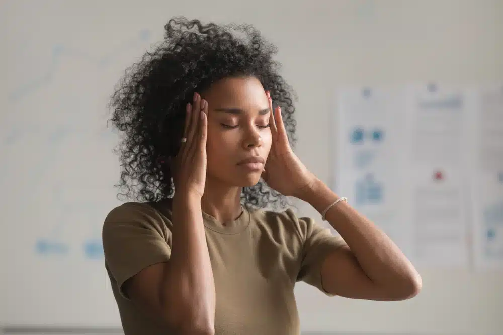 a young woman practicing coping strategies